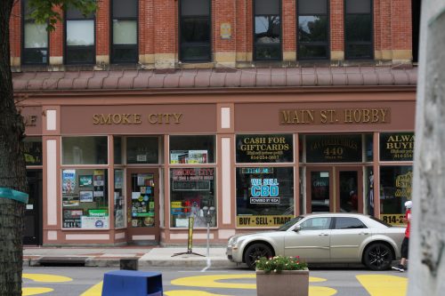 Historic brick storefronts with vintage signage on a downtown main street